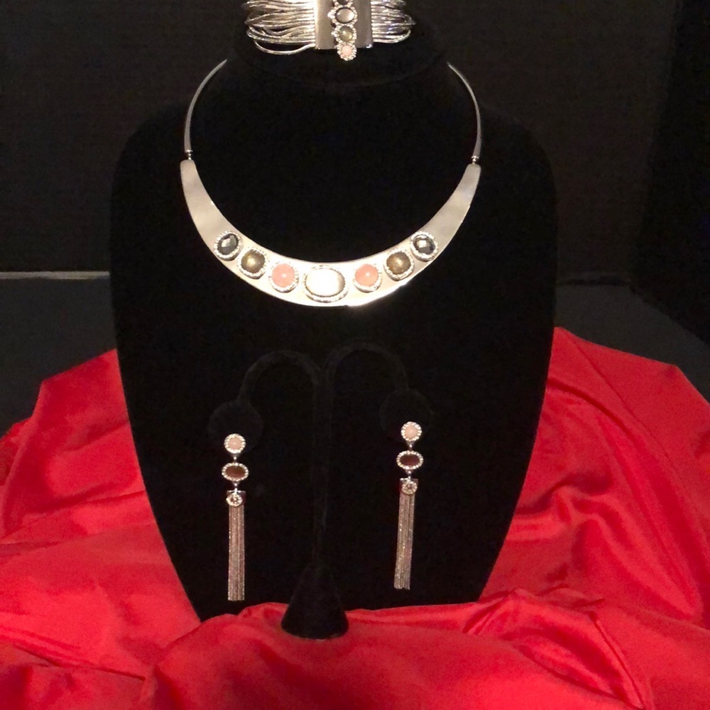 The silvertone tassels on these amazing  move with you for modern style.